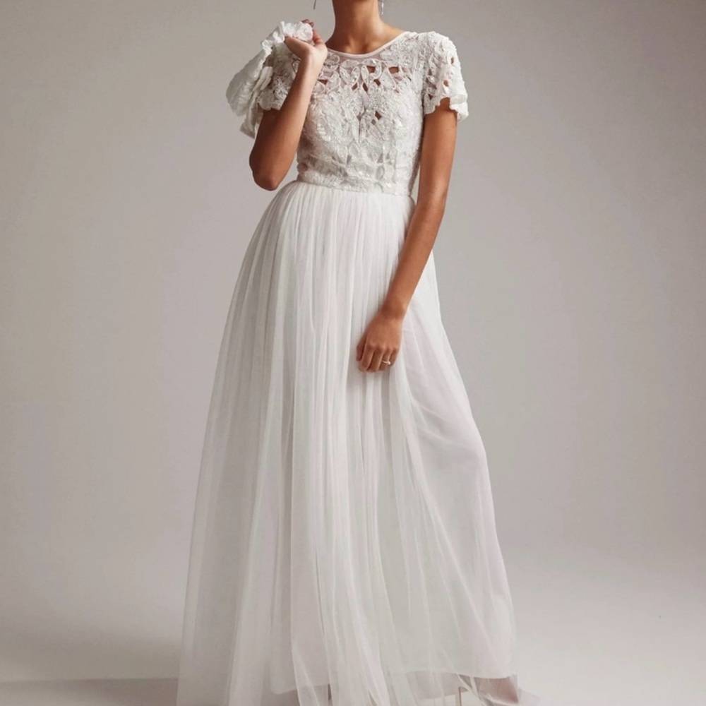 ASOS DESIGN Isabelle sequin cutwork bodice maxi
wedding dress w/ cap sleeve